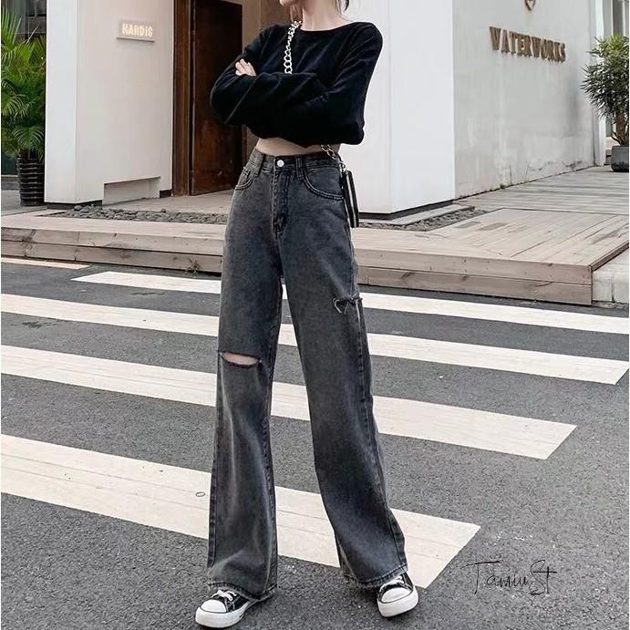 Quần jean ống rộng màu đen ghi rách gối cá tính