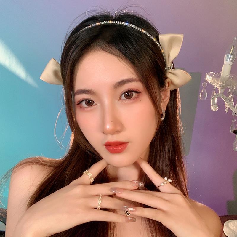 Băng đô hai bên phối nơ màu đen đính đá phong cách Hàn Quốc sang trọng