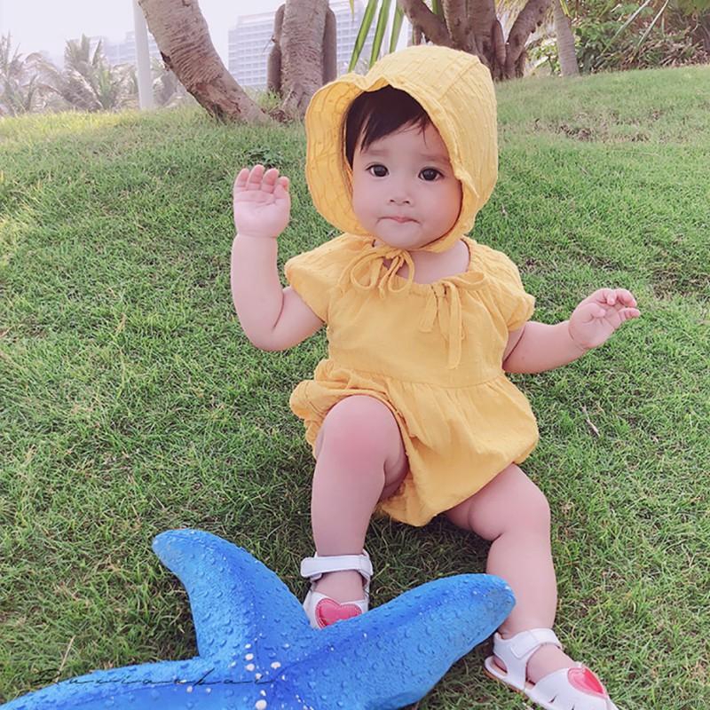Set jumpsuit cổ tròn tay phồng + nón cho bé