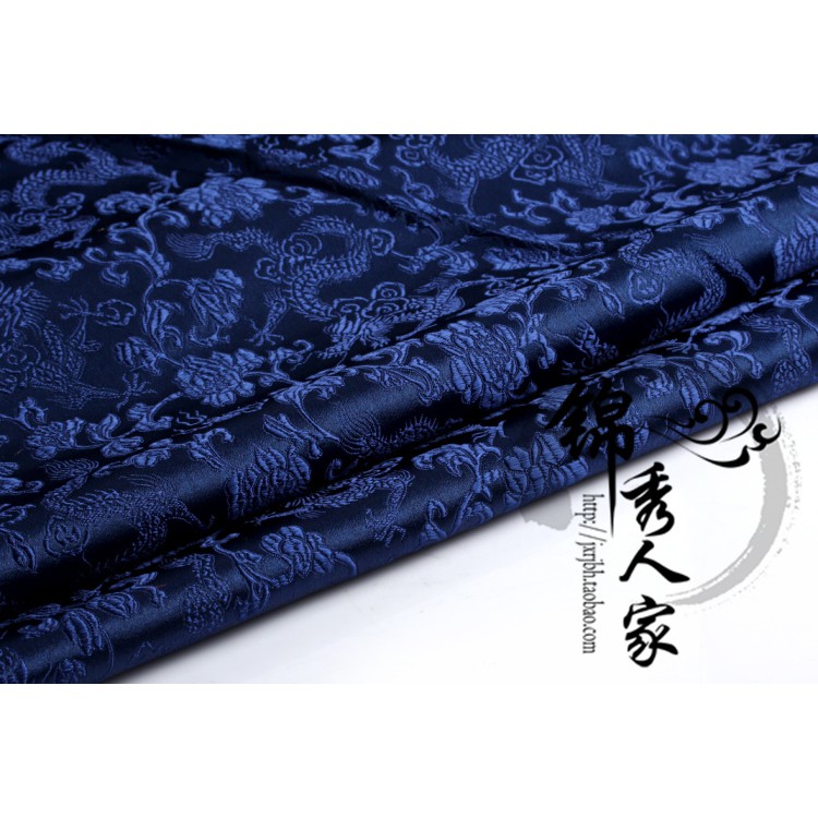Vải thêu họa tiết rồng nền xanh dương dùng may sườn xám Trung Hoa