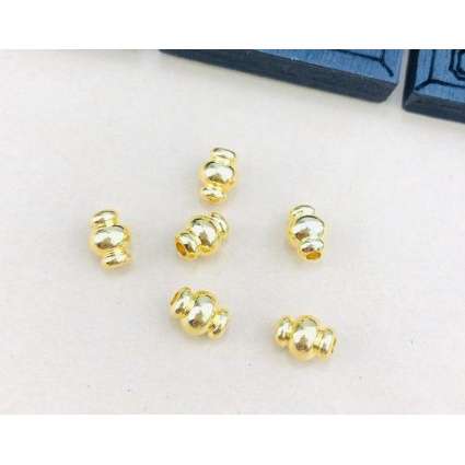 set 2 hạt trang trí dùng xỏ vòng chất liệu đồng 6x8mm