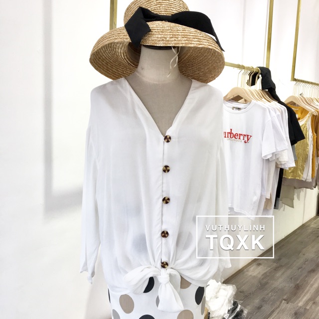 Áo sơ mi khuy sừng