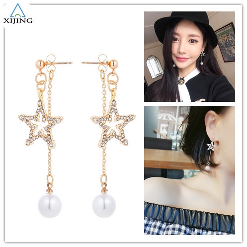 Hoa tai dáng dài phối tua rua phong cách