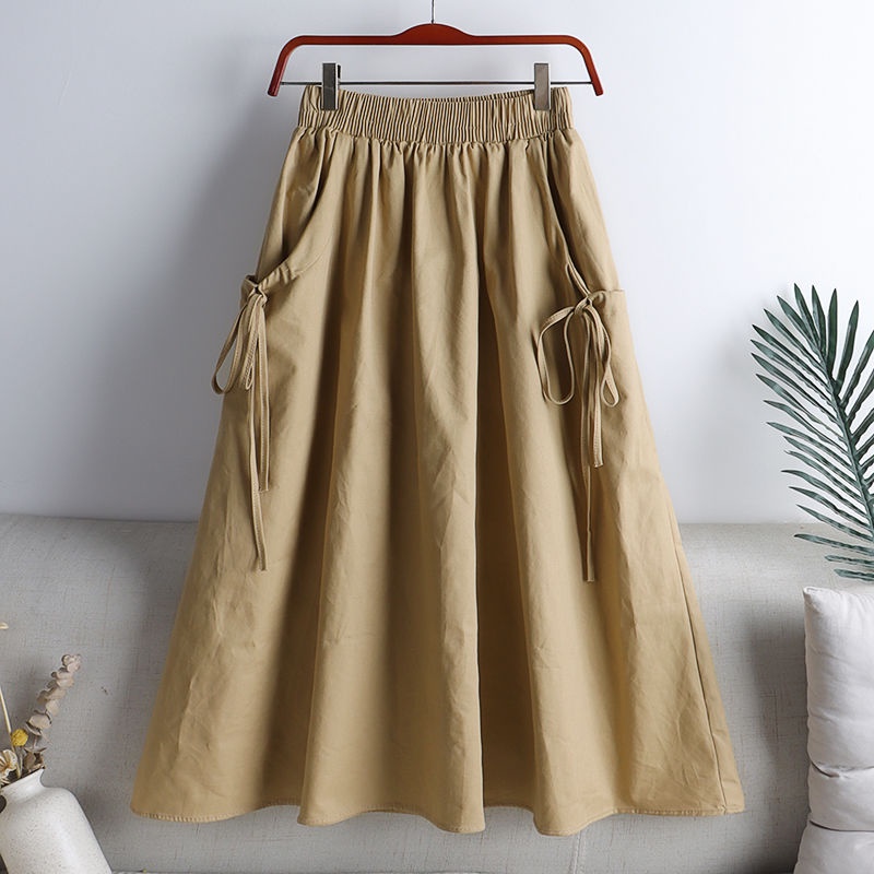 Váy Yếm Cotton Dáng Chữ a Dài Ngang Gối Màu Trơn Phối Dây Rút Và Túi Hàng Mới