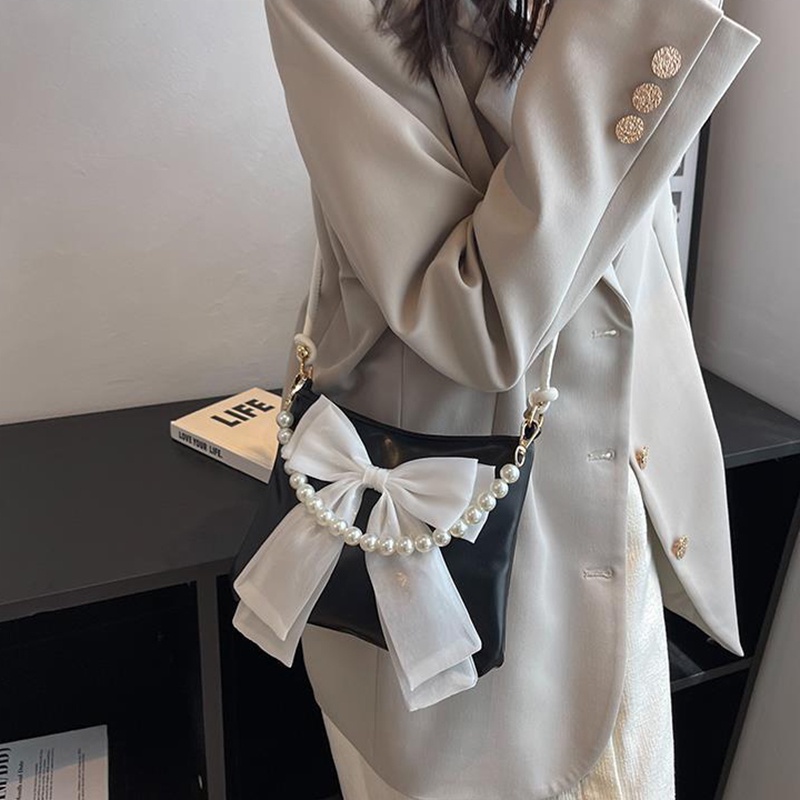 Túi đeo chéo Ielgy dạng xô thắt nơ thích hợp cho tất cả các phong cách dành cho bạn nữ