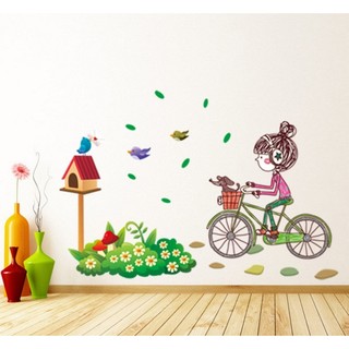 Decal dán tường mẫu cô bé đi xe đạp và tổ chim xinh