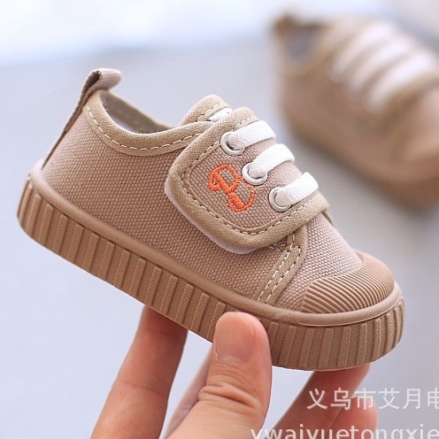 Giày thể thao quai dán tiện lợi cho bé trai bé gái tập đi đế mềm sz 18-23