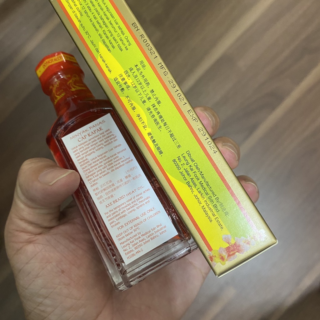 Dầu Nóng Hồng Hoa Hiệu Cây Búa Red Oil Flower 32ml Axe Brand