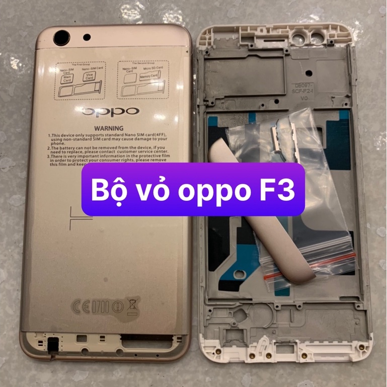 bộ vỏ oppo F3 - bộ gồm lưng,xương,phím, kính camera