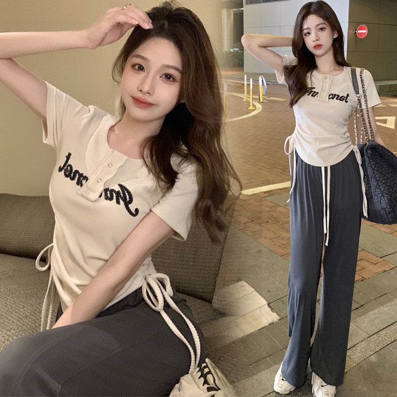 Set đồ UIOWOO gồm áo thun ngắn tay in chữ và quần dài ống rộng thời trang Hàn Quốc