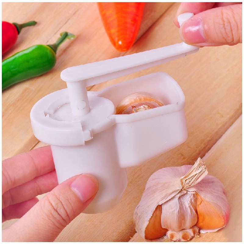 Dụng cụ nghiền gừng tỏi dạng xoay tiện lợi