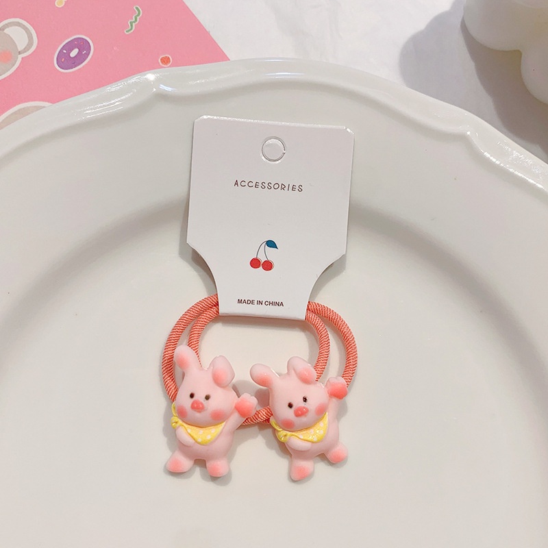 Dây thun cột tóc gắn hình chú heo hồng đáng yêu cho bé gái