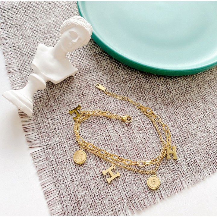 Lắc tay titan cao cấp chữ H HIP HOP màu vàng siêu đẹp, bền màu, chuẩn thời trang, mang phong cách độc đáo cá tính