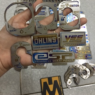 Dán ổ khóa titan cho tất cả các loại xe 70k  1 miếng ,