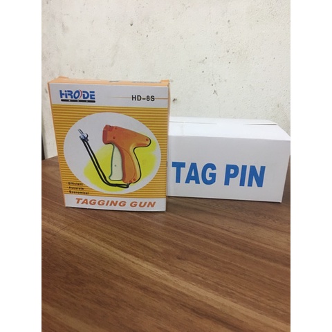 Máy gắn mác sản phẩm dùng cho shop thời trang để gắn tag, mác quần áo