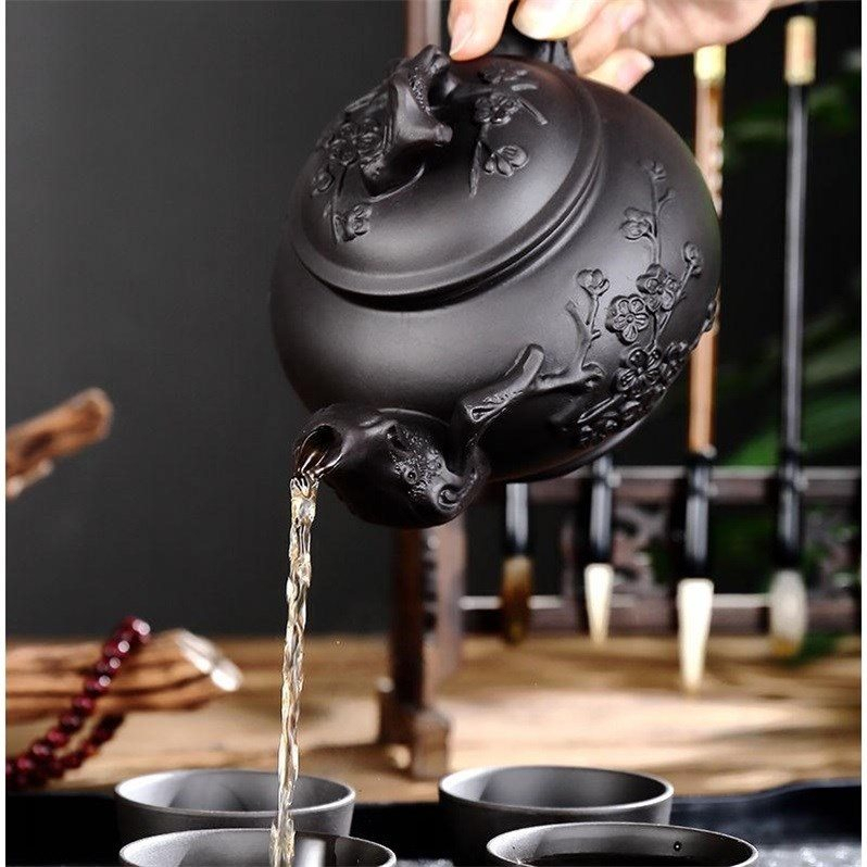 Bộ ấm sứ 400ml + 3 chiếc ly sứ 60ml làm bằng đất Tử Sa dùng để uống trà kiểu dáng thanh lịch
