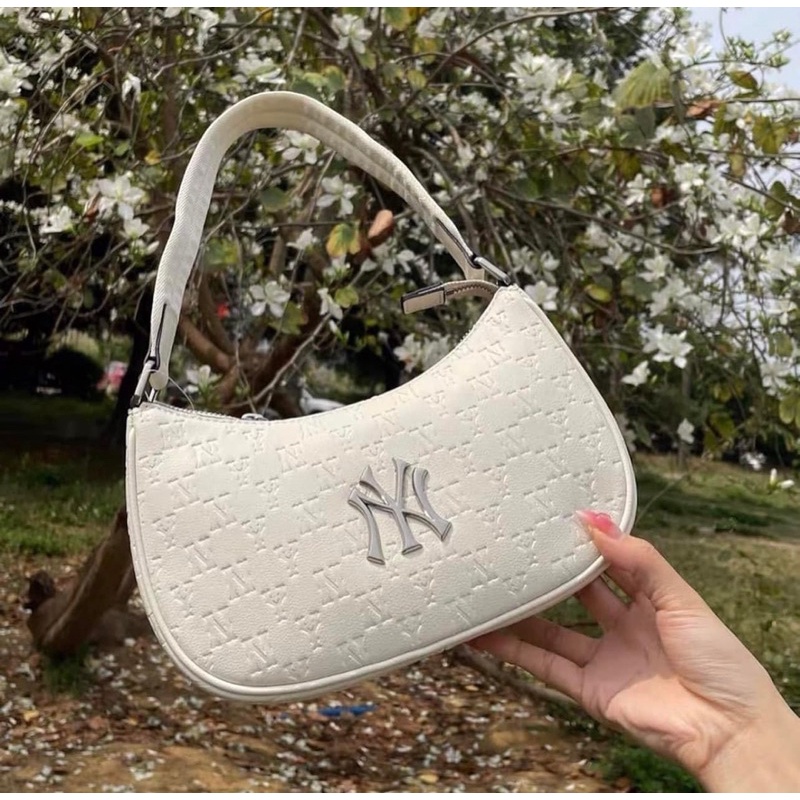 Túi kẹp nách da hoạ tiết monogram chìm
