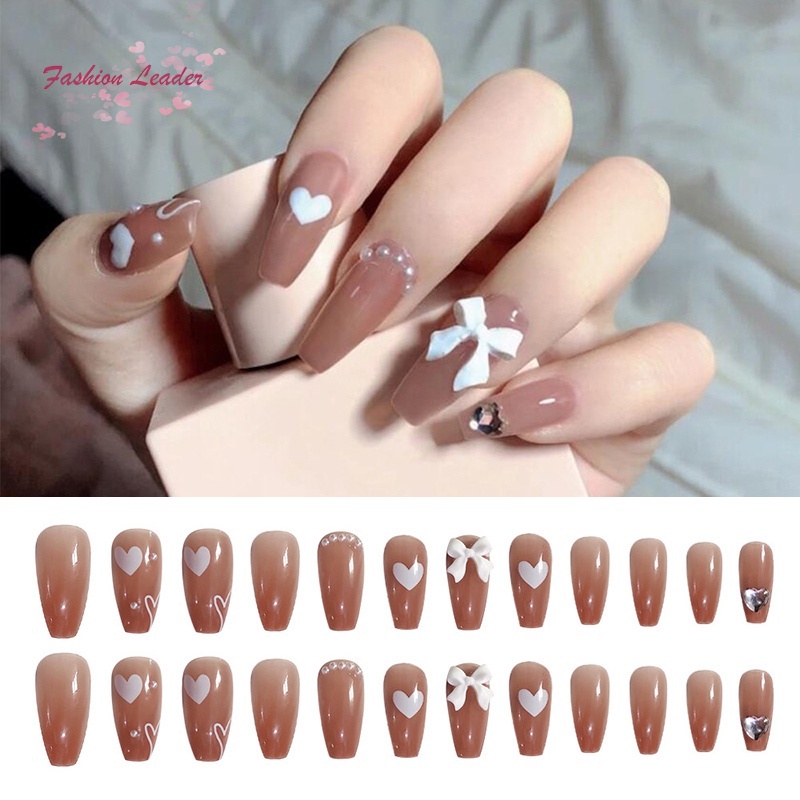 Bộ 24 móng tay giả dài màu trắng ôm khít hoàn toàn đính nơ trái tim xinh xắn