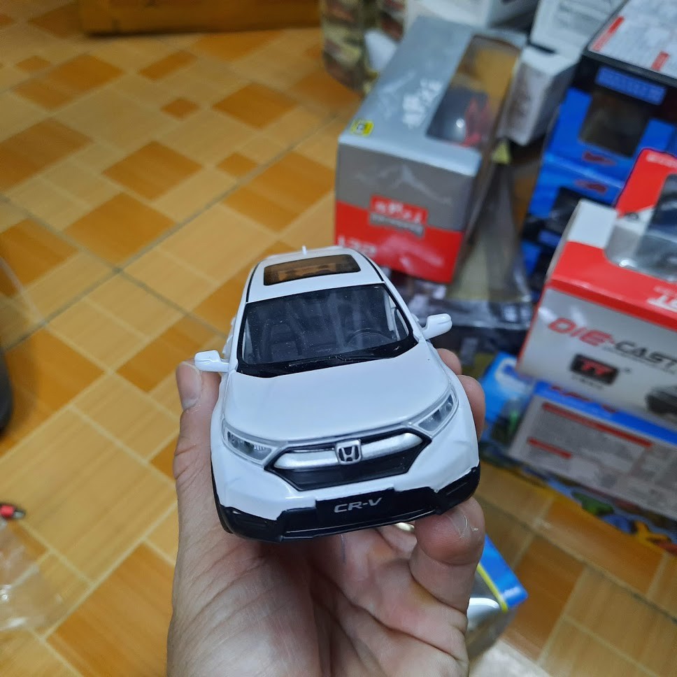 Mô hình xe ô tô HONDA CRV tỉ lệ 1:32 bằng sắt xe chạy cót có âm thanh và đèn khi mở cửa