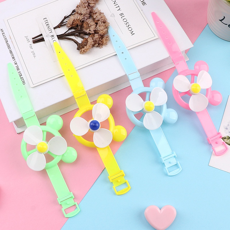 Đồ chơi đồng hồ chong chóng cánh xoay gió nhiều màu sắc - phụ kiện đáng yêu cho bé KingKids