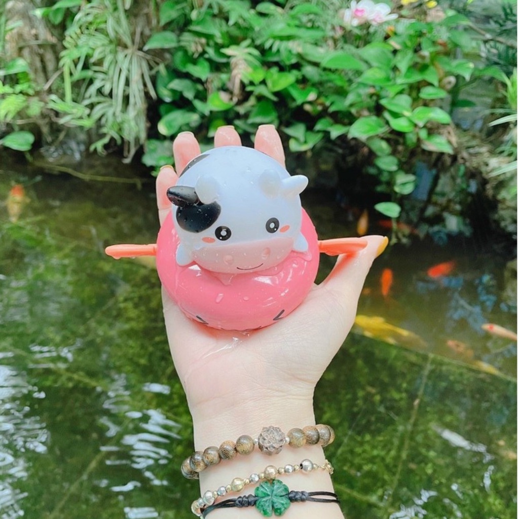 Đồ chơi nhà tắm cho bé, dạng THÚ BƠI BÒ, HEO PHUN NƯỚC CHÈO THUYỀN THẢ BỒN TẮM CHO BÉ