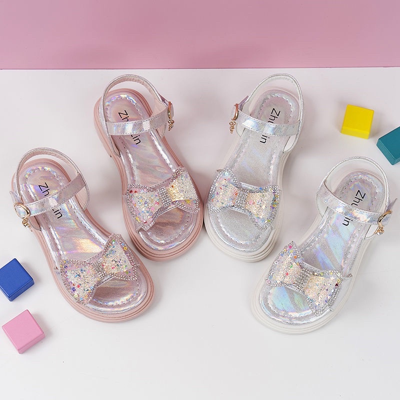 Sandal Bé Gái Đi Học Đi Chơi Nơ Đính Đá Xinh Xắn Phong Cách Công Chúa, Đế Mềm Êm Chân C91