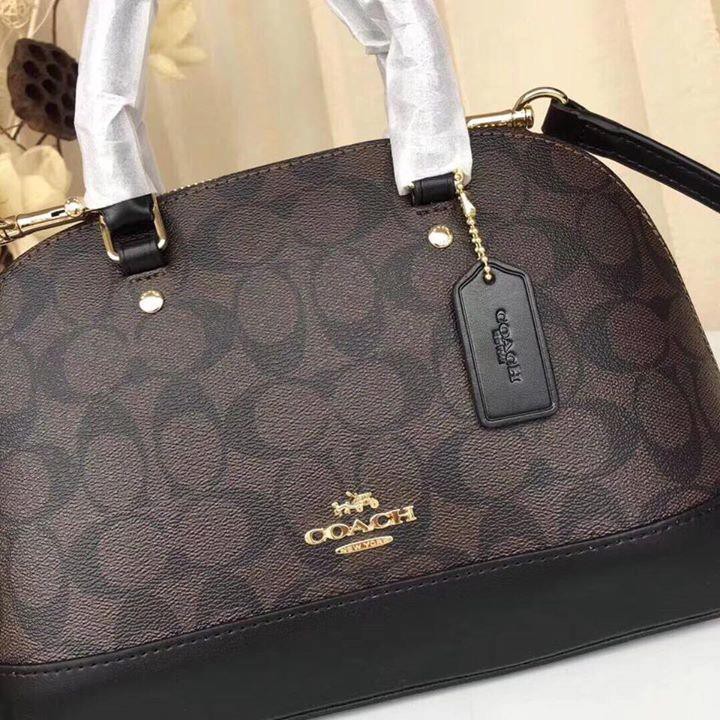 Túi xách Coach hến nâu đen đậm