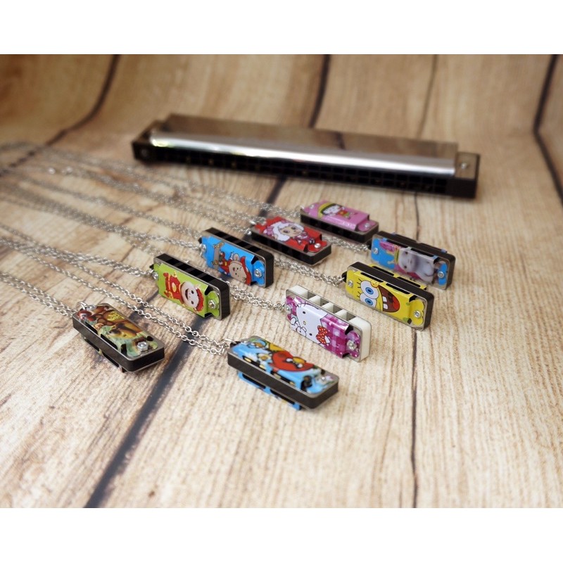 Kèn mini harmonica 4 lỗ hoạt hoạ dây chuyền