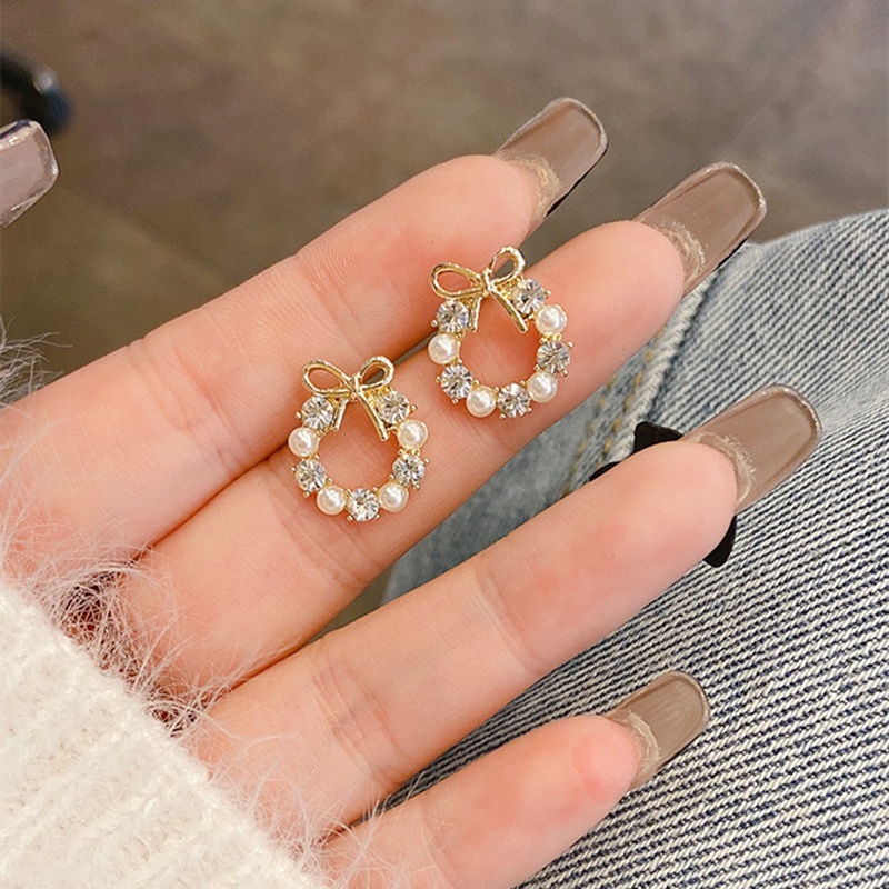 Bông tai trang trí nơ đính hạt ngọc trai phong cách Hàn Quốc dành cho nữ