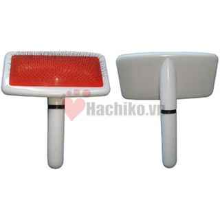Lược nhựa trắng chải lông chó mèo