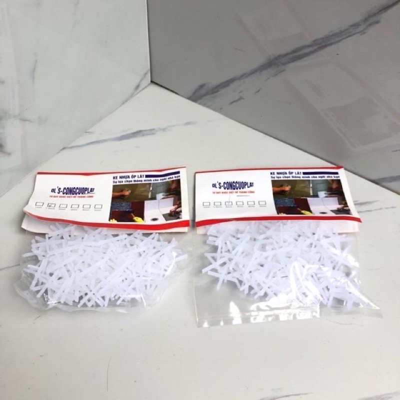 Ke nhựa lát gạch hình chữ thập