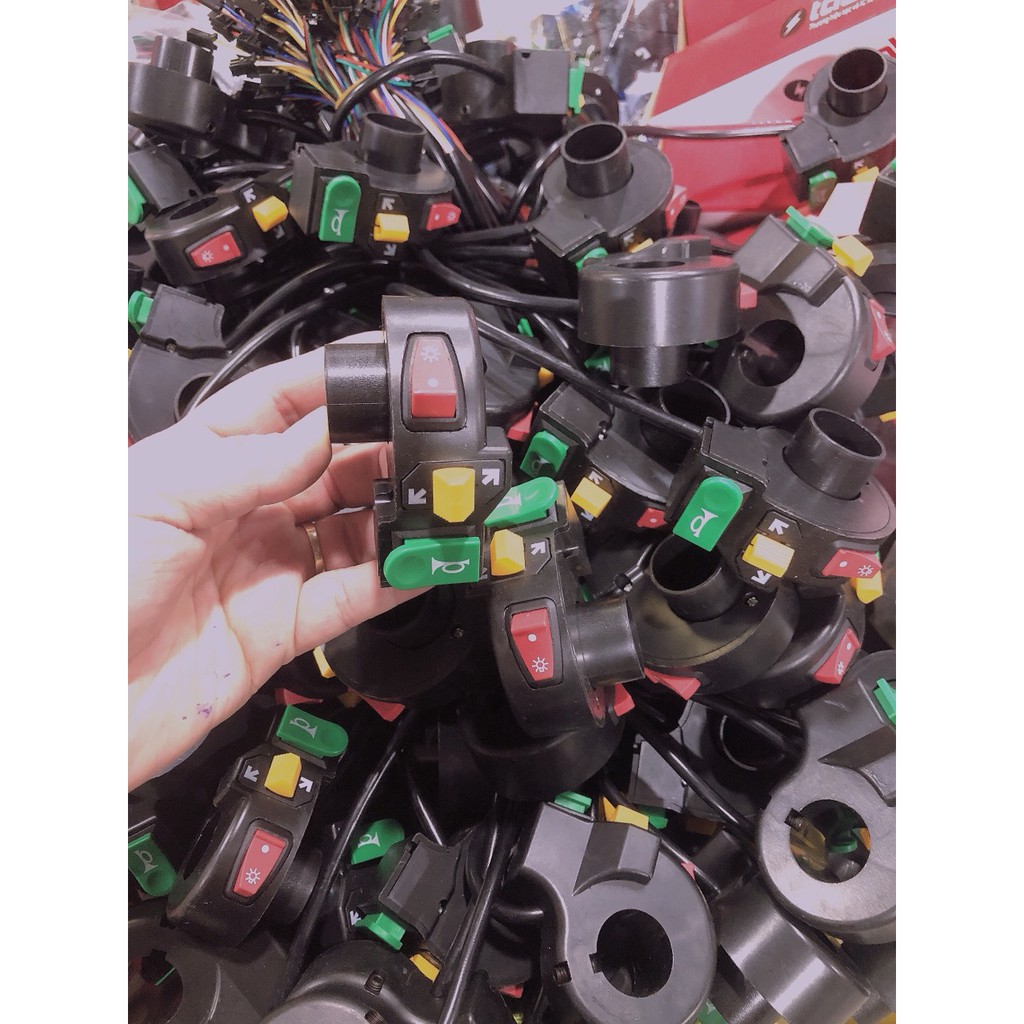 Cụm công tắc đèn còi xi nhan xe cỏ