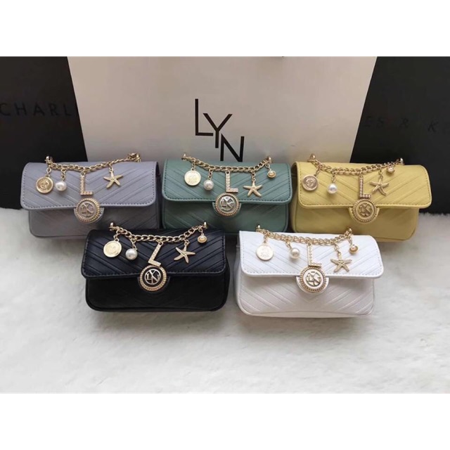 Túi LYN huy hiệu size 18