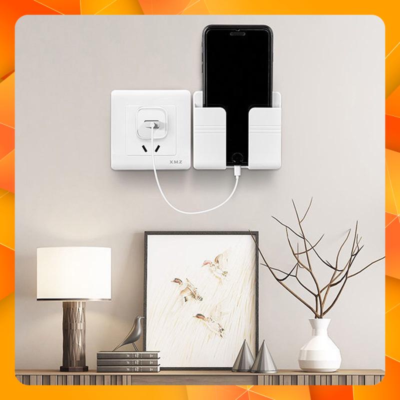 Kệ để điện thoại dán tường, đựng điều khiển, remost đa năng, Giá đỡ điện thoại có lỗ cắm sạc thông minh tiện lợi