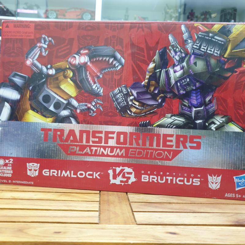 Mô Hình Transformers Bruticus Vs Grimlock
