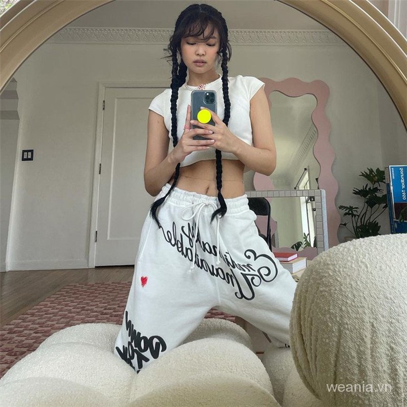 Quần dài lưng cao phối dây rút in chữ cá tính cho nữ