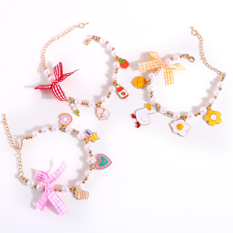 vòng cổ trân châu có charm và nơ cho chó mèo