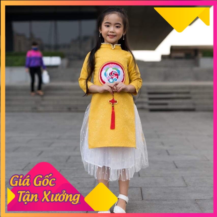 Áo dài cách tân cho bé gái 2-12 tuổi vải gấm Hàn vàng thêu đáp chim hạc đào hàng thiết kế