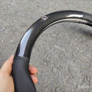Bọc da vô lăng cacbon có logo MAZDA
