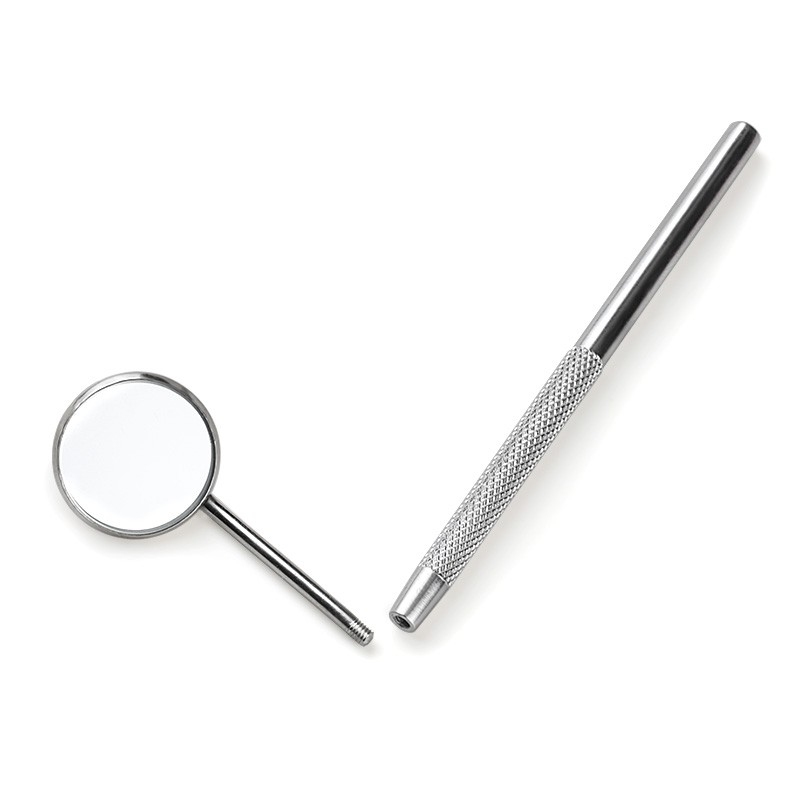 Một gương răng thép không gỉ để kiểm tra sự giãn nở lông mi bằng thiết bị in Mi-Press.