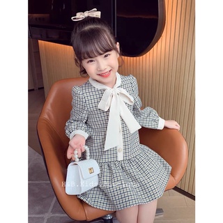 Váy kẻ cổ nơ đuôi cá bé gái