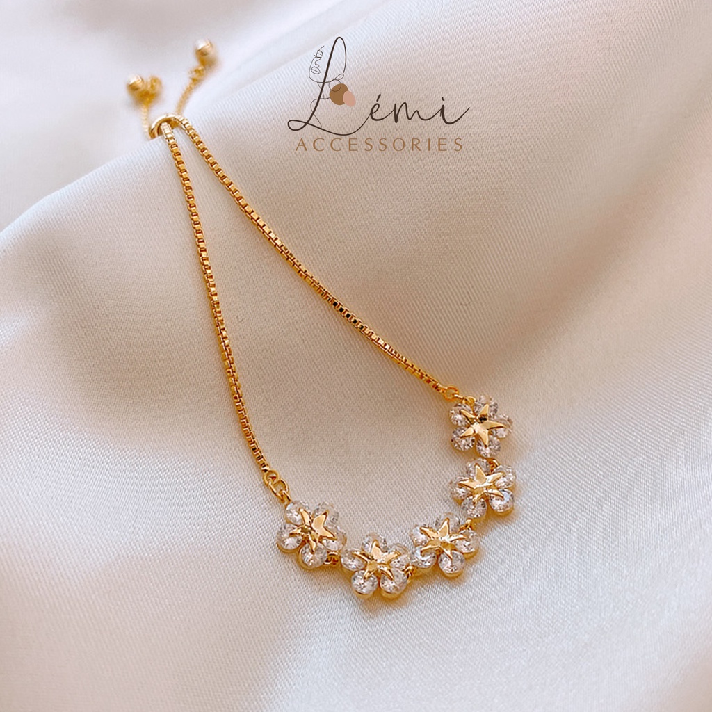Vòng tay nữ titan lắc tay hoa mai đính đá Lémi bền màu có dây dút chỉnh kích thước tiện dụng Lémi accesories