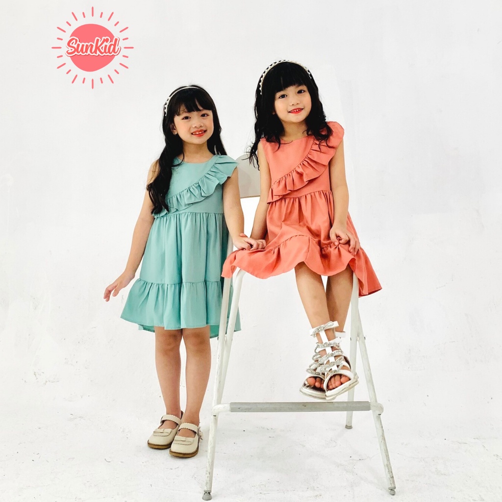 Váy bé gái dáng suông vạt chéo Sunkid SN5 vải trượt nhật cao cấp mùa hè từ 4 - 12 tuổi màu xanh,màu hồng