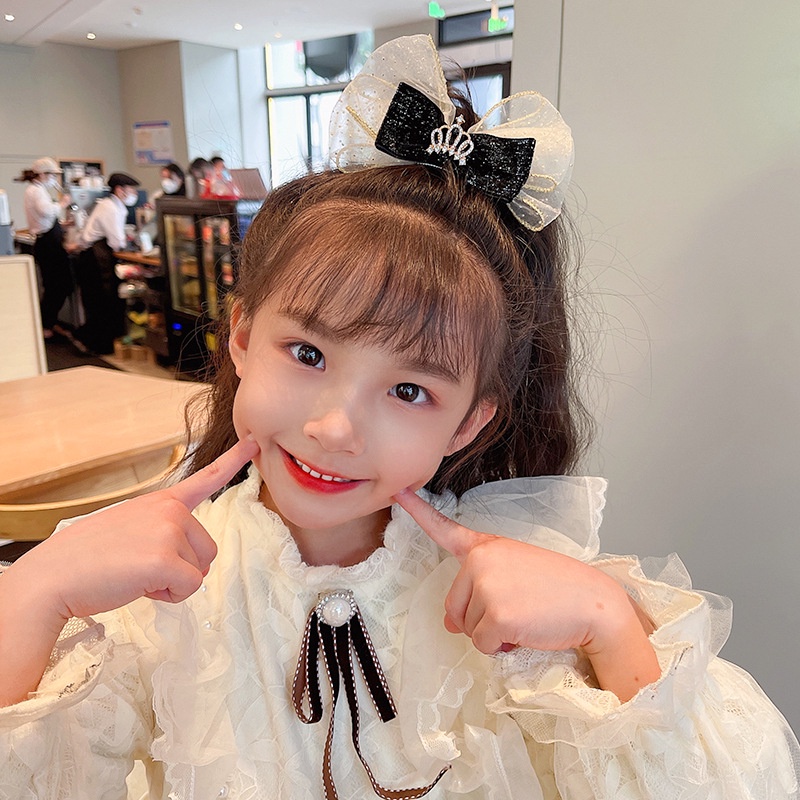 Kẹp tóc hình nơ xinh xắn cho bé gái