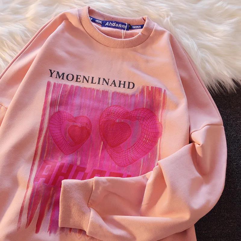 Áo thun tay dài cổ tròn in họa tiết trái tim thời trang dành cho nữ