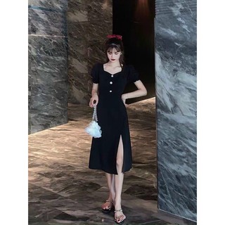 Đầm dài sẻ đùi nơ lưng