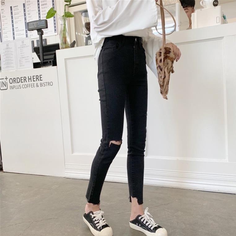 Quần jeans đen lưng cao rách gối tua gấu