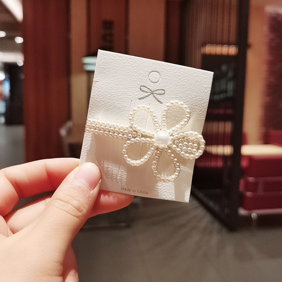 Kẹp tóc đính ngọc trai nhân tạo hình bông hoa xinh xắn cho nữ