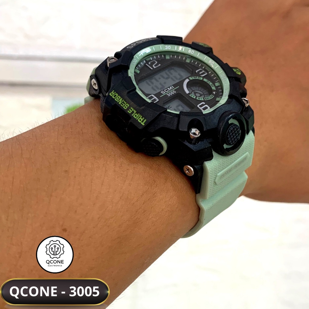 Đồng hồ điện tử trẻ em bé trai và bé gái chống nước Qcone 3005 chống nước 30m đa chức năng có đèn led 7 màu