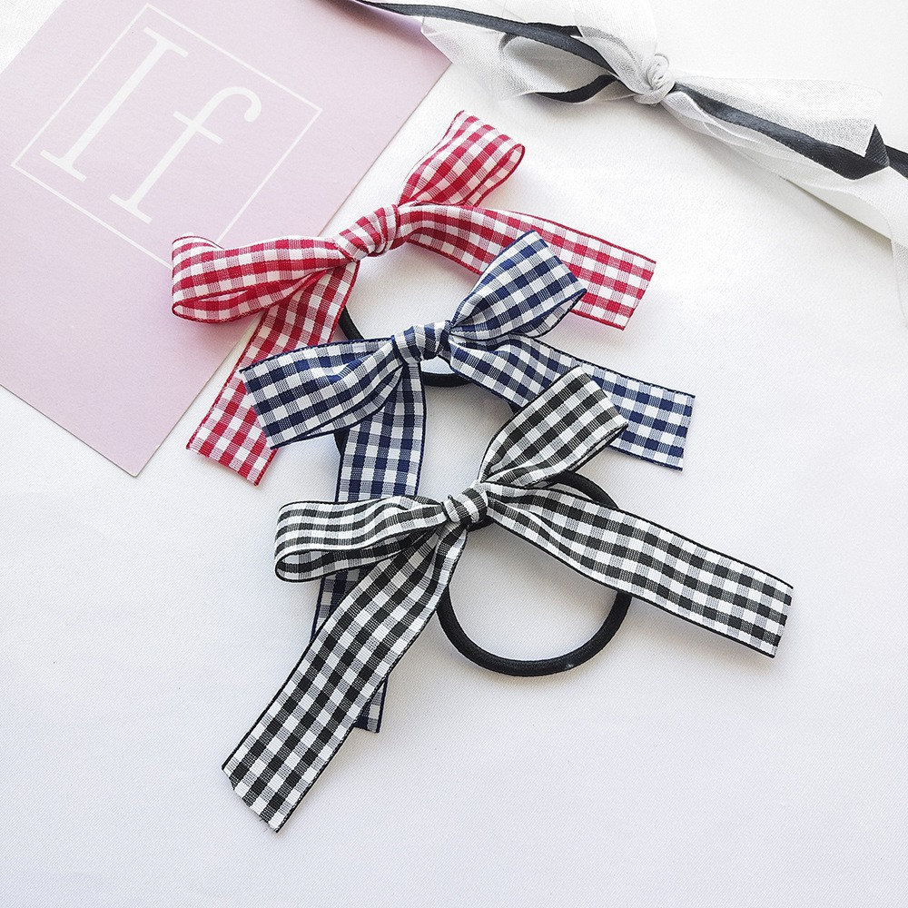 Thun cột tóc phối nơ B549 đính ngọc trai phong cách thời trang dễ thương